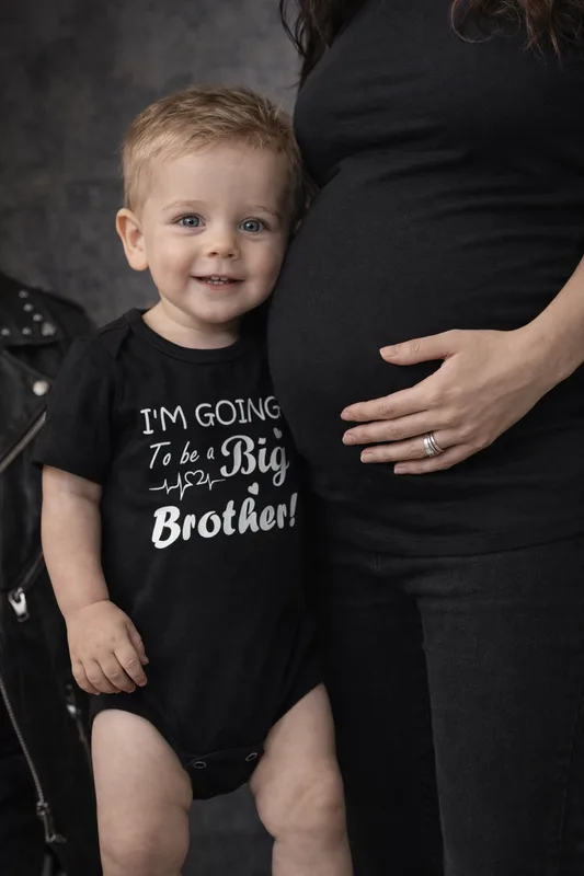 בגד גוף לאח שנולד